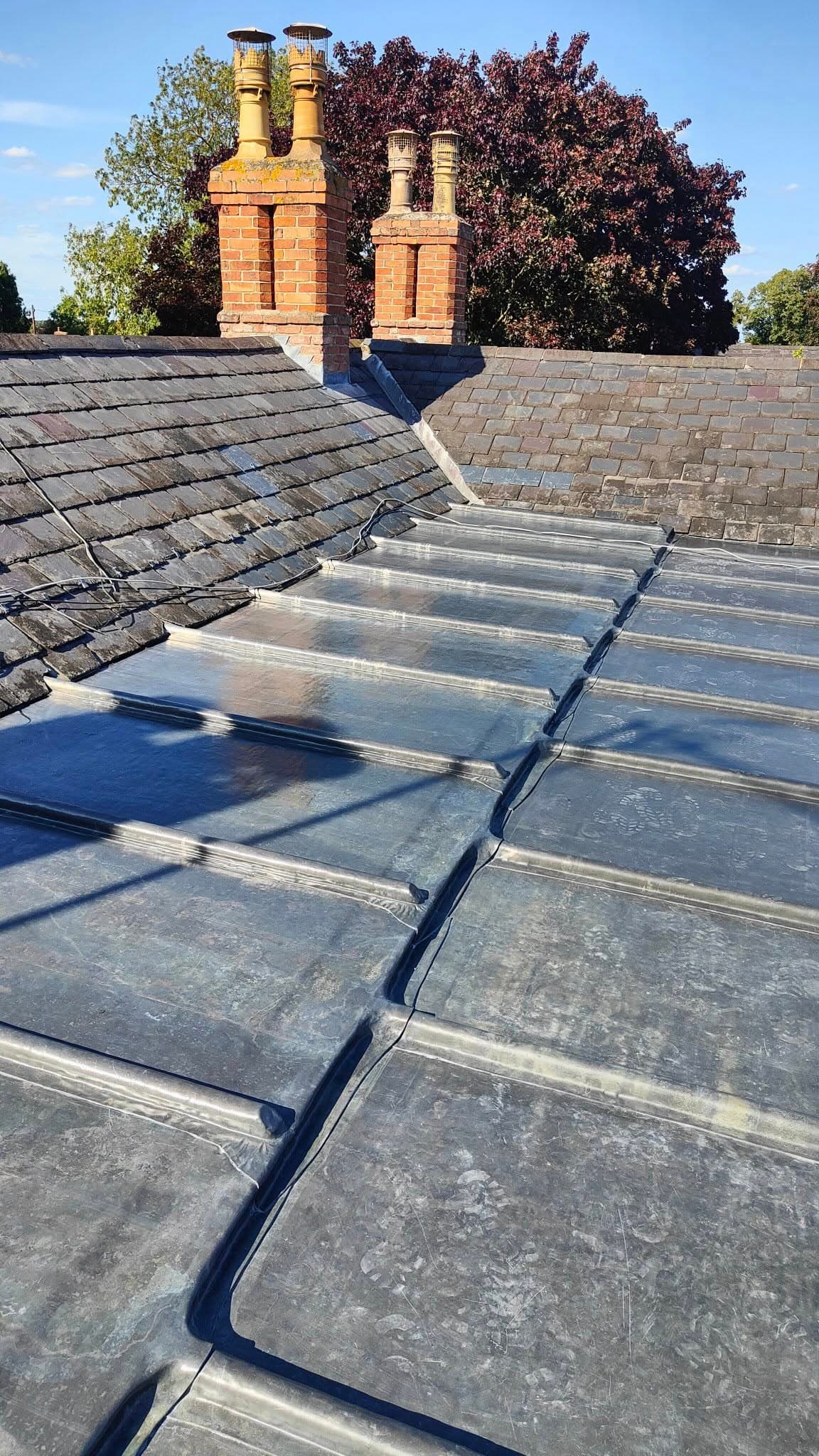 Hand-dressed leadwork on a Nottingham roof